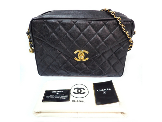 Chanel Camera Caviar bag in black leather with gold CC logo, authenticity card, dust bag, and Chanel booklet included.