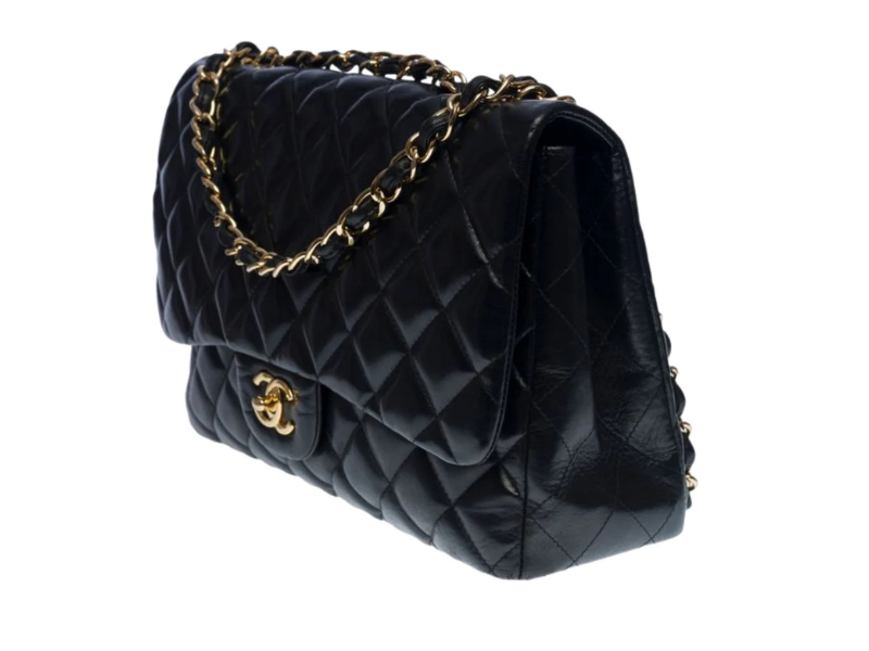 Chanel Classic Jumbo flap bag in black lambskin with 24k gold hardware, vintage design, preloved luxury handbag.