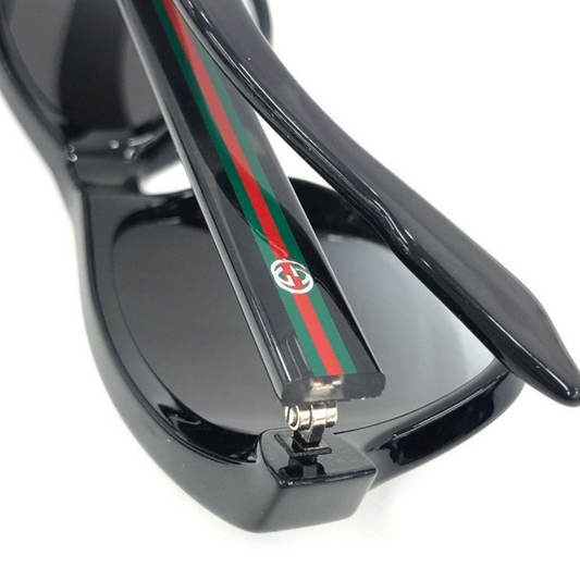 Gucci GG 3709S detaljer af sidebøjle med ikonisk grøn-rød Gucci-stribe – identificer stilen præcist