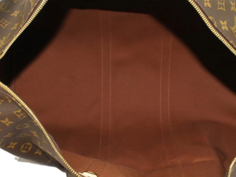 Louis Vuitton Keepall Bandoulière 55 – indvendigt rum med god plads til rejseopbevaring og ideel som håndbagage