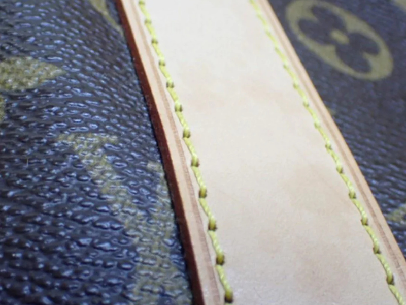Louis Vuitton Keepall Bandoulière – rejsetaske med justerbar skulderrem og messinghardware