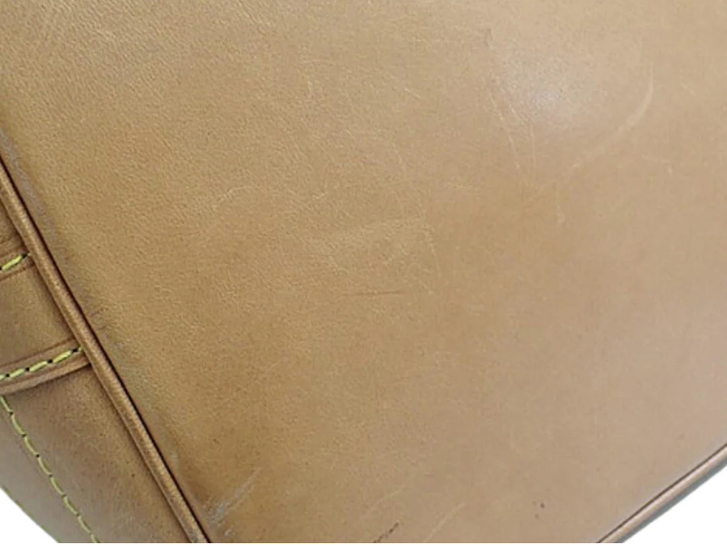Louis Vuitton Noé monogram bucket bag – detalje af ægte læderbund med naturlig patina