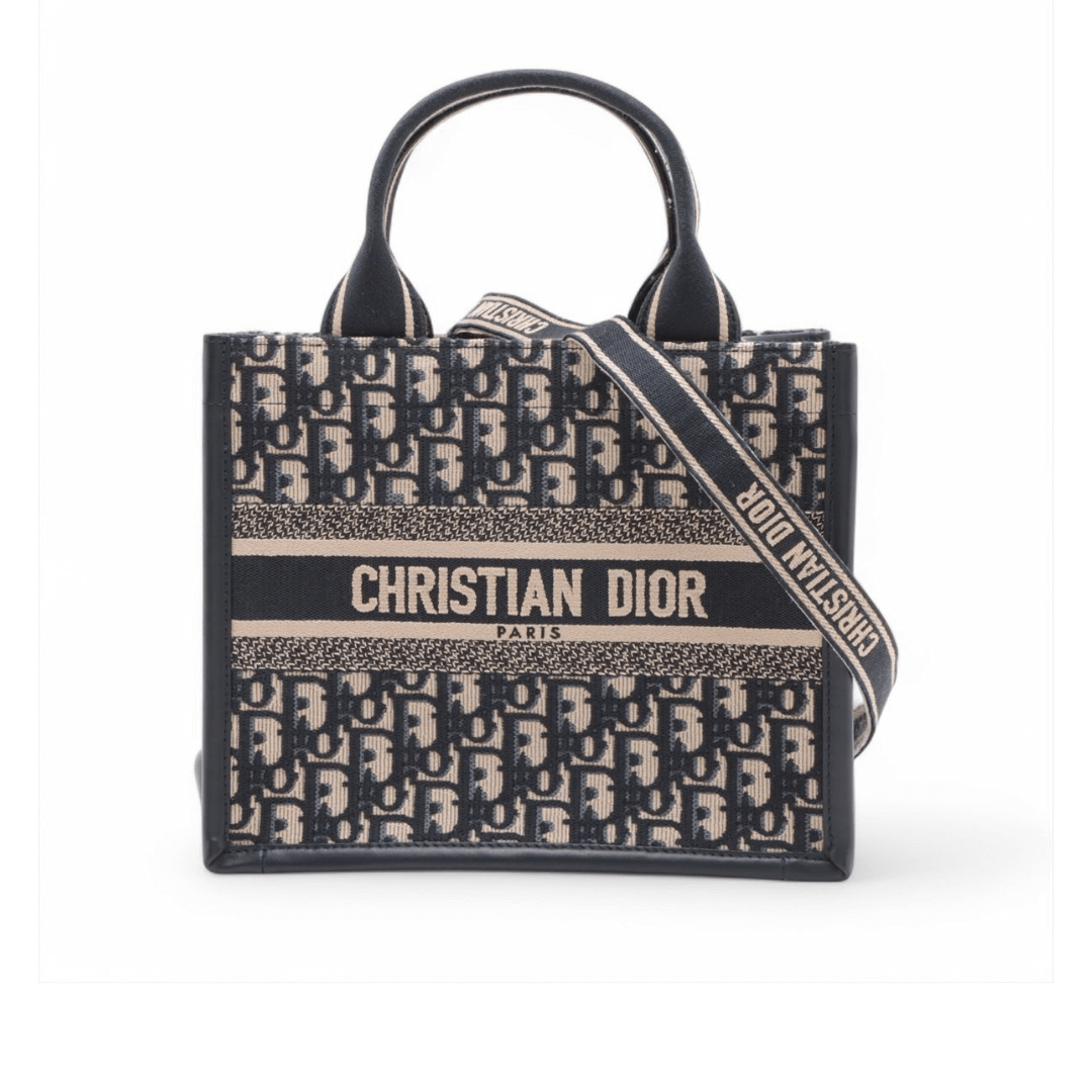 Christian Dior Paris tote bag featuring signature pattern and logo strap, representing timeless French elegance.