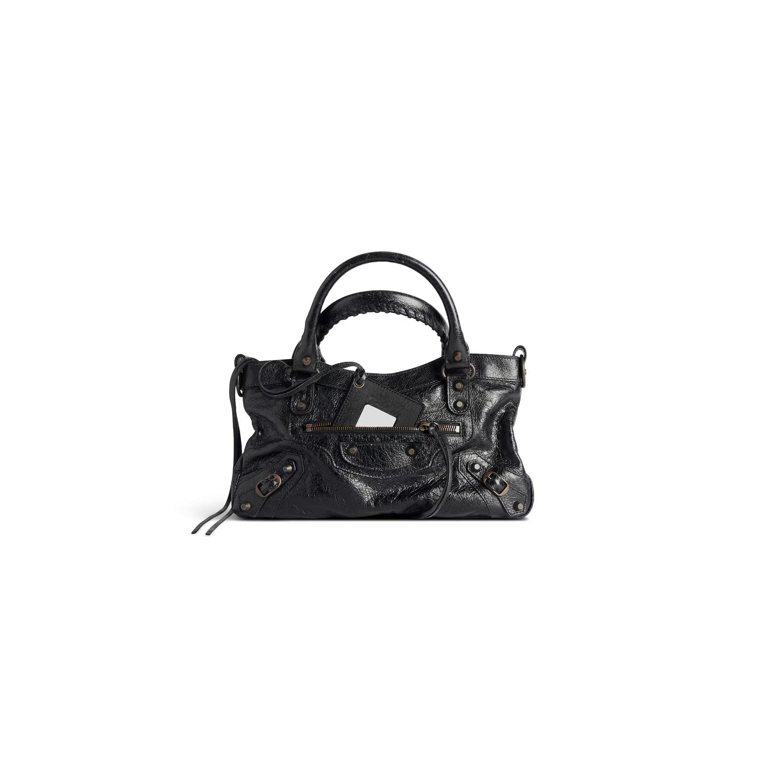 Balenciaga black leather bag with unique design and multiple pockets, showcasing avant-garde luxury.
