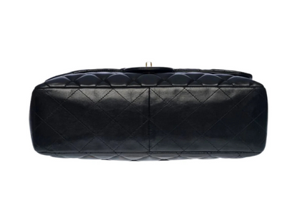 Chanel Classic Jumbo flap bag base view showcasing luxurious lambskin and classic quilted design.