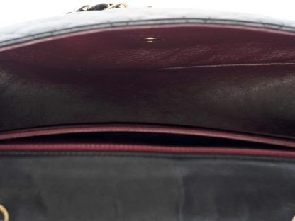 Interior view of the Chanel Classic Jumbo flap bag showcasing soft leather lining and organizational compartments.