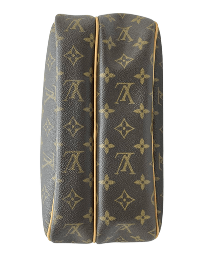 Louis Vuitton Reporter PM Monogram Canvas bund med det ikoniske monogram canvas og stilfulde design