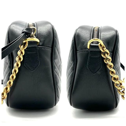 Sider af Gucci GG Marmont Mini crossbody taske med kæderem i antik guld