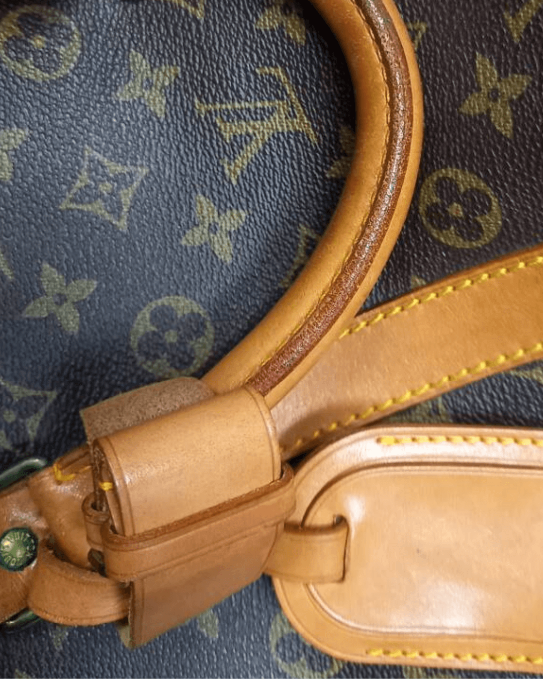 Tophåndtag på Louis Vuitton Keepall 55 i læder