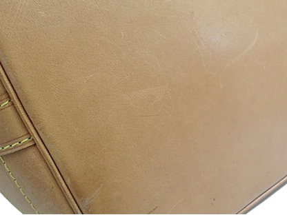 Louis Vuitton Noé monogram bucket bag – detalje af ægte læderbund med naturlig patina
