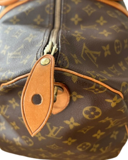 Louis Vuitton Keepall 55 vintage 1982 – lynlåsetiket og hul